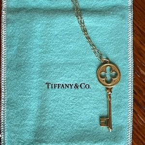Retired Tiffany Quatrefoil Gold and Diamond key necklace 18kt